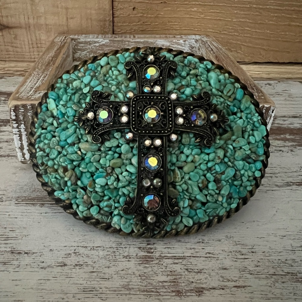 Western style belt buckle with cross and turquoise detail. It’s Vintage NWT